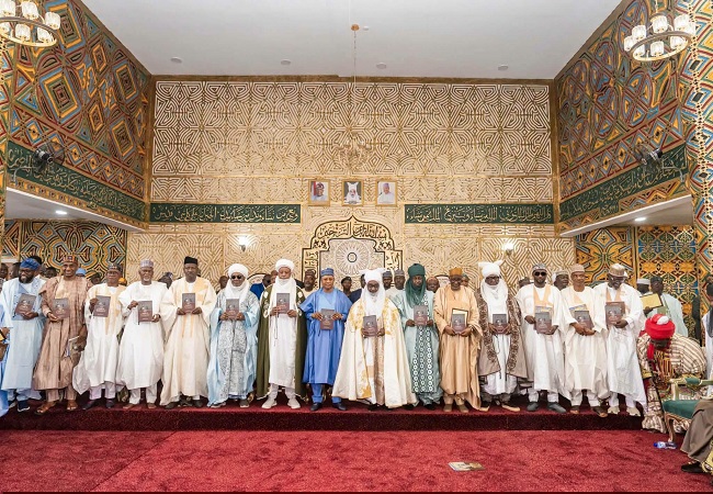AHMADU AT SIX: Every Legacy Has a Lifespan — Until It Is Written Into History U.S. Machika Wednesday, 7 October 2026, marks six years since Ambassador Ahmed Nuhu Bamalli, CFR, was appointed Emir of Zazzau. There is an intriguing symmetry to the occasion: he was appointed to the throne on a Wednesday; six years later, his anniversary falls again on a Wednesday; and, as if completing the circle, he himself was born on a Wednesday. It is on this sixth anniversary, itself falling on a Wednesday, that the Emir of Zazzau presented the long-awaited book, “EMIRS OF ZAZZAU: A Biographical Study, 1808–2025,” to the public, commissioned four years ago by the Emir himself. The convergence is striking: one Wednesday marks his birth, another his accession, and yet another now marks six years of his reign and the presentation of a work intended to preserve the Emirate’s history.